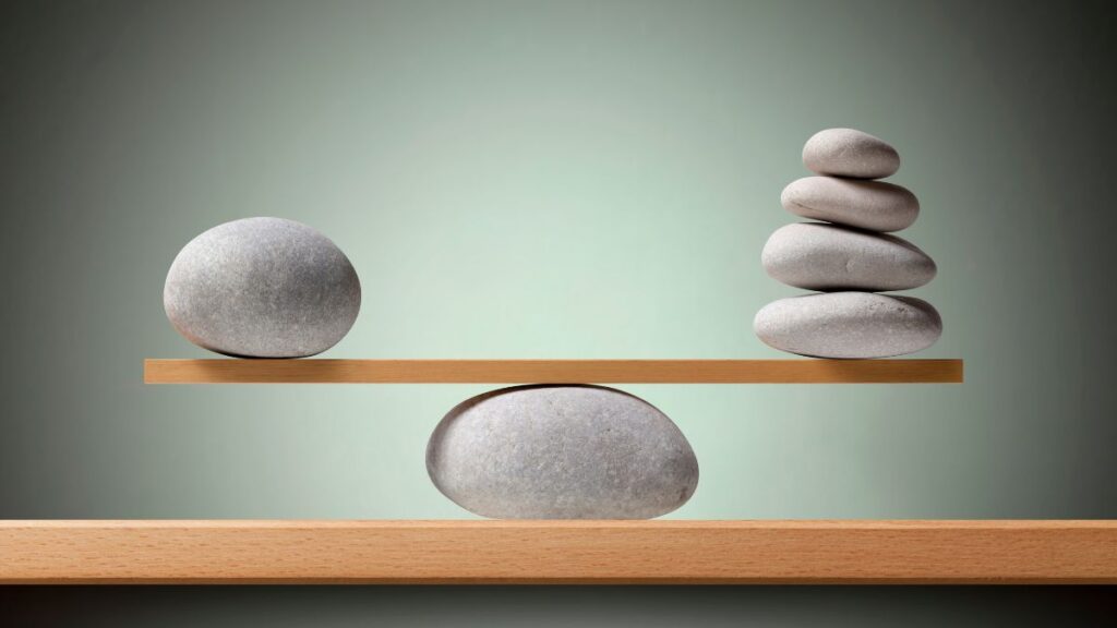 A balanced arrangement of smooth stones symbolizing portfolio rebalancing and asset alignment