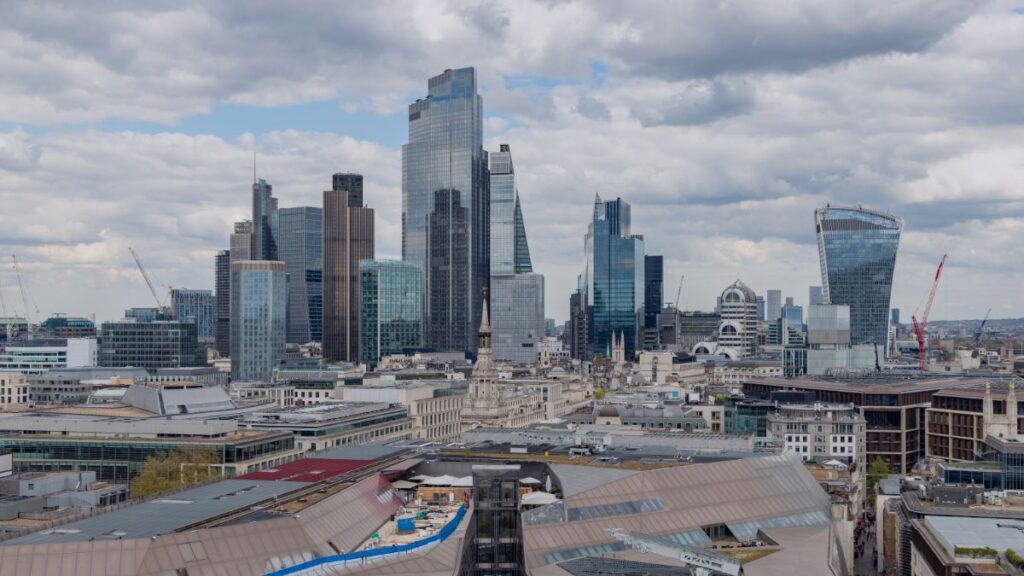 London financial district skyline representing UK economic changes affecting British expats