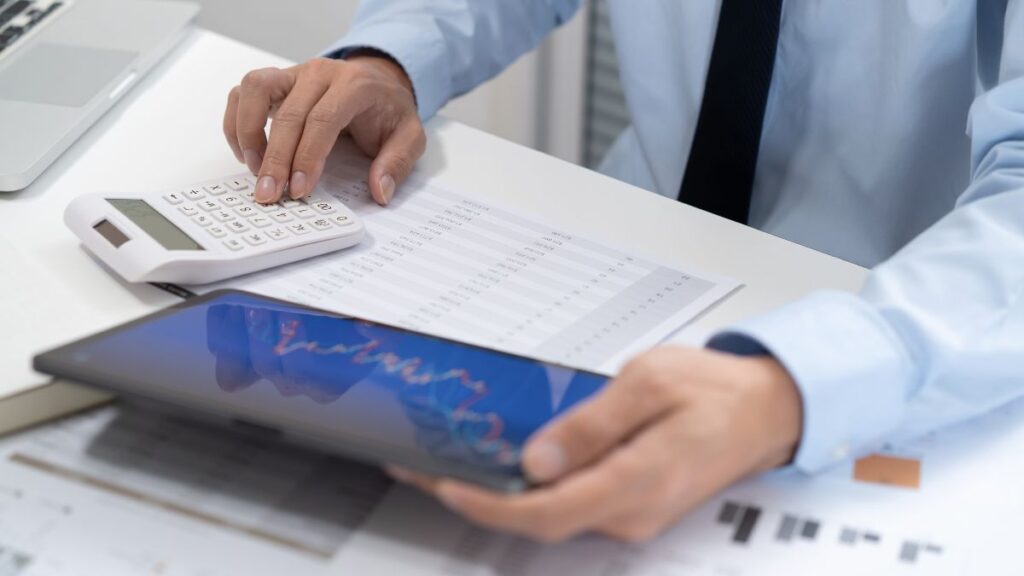 Professional reviewing IRA records and calculations for accurate Form 8606 reporting