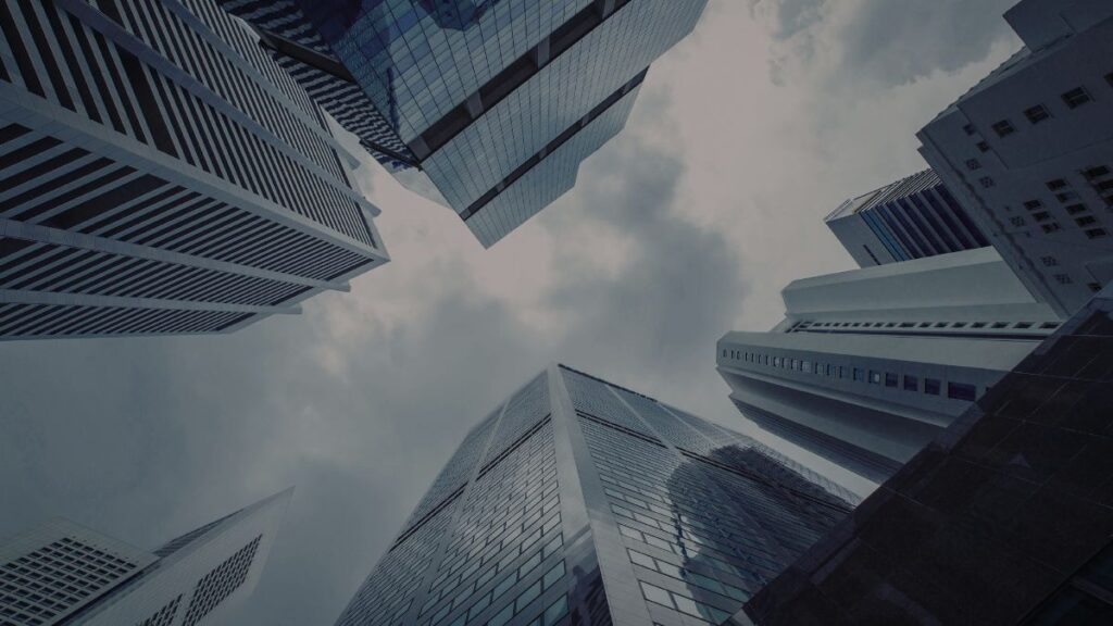 Modern financial district buildings representing global markets and economic structure