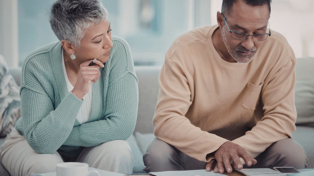 Couple reviewing retirement documents together